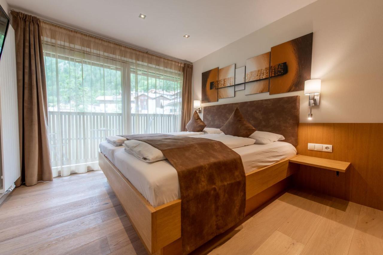 Lapis Monti - Apartments & Suites Burgusio Esterno foto